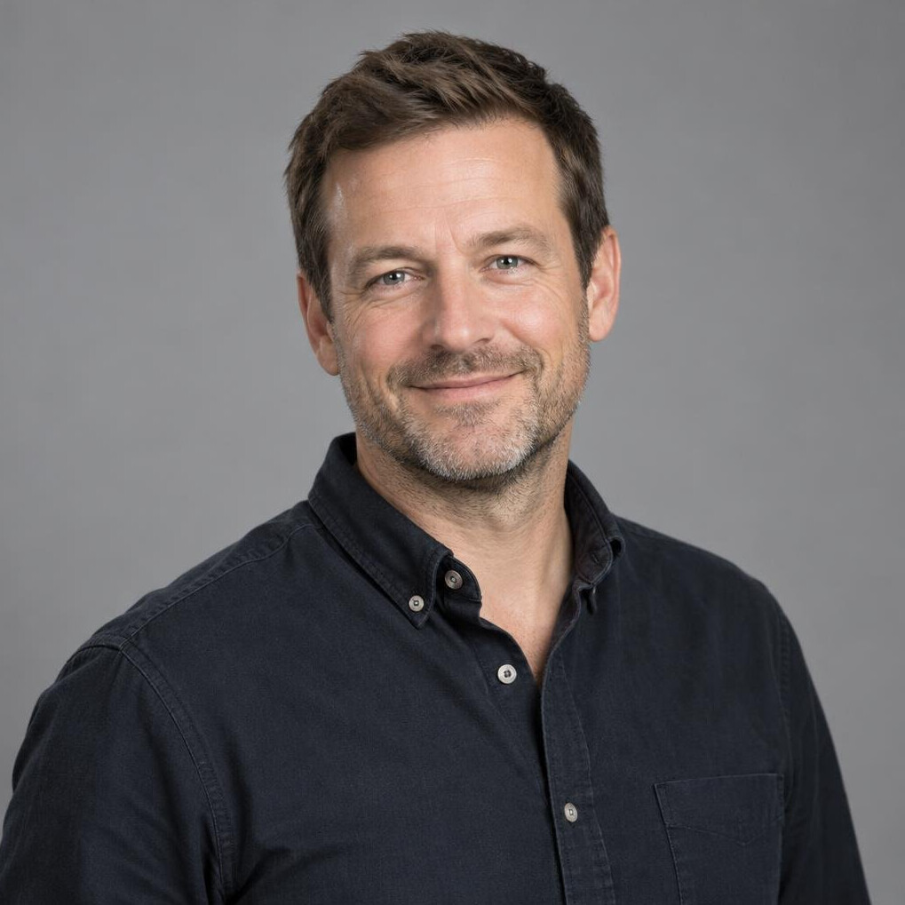 Portrait of a smiling man in a casual shirt